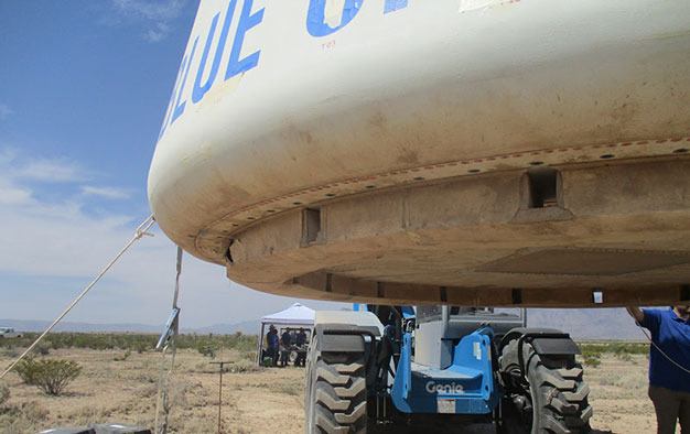 Blue Origin's crew capsule during a post-landing recovery operation in Texas.