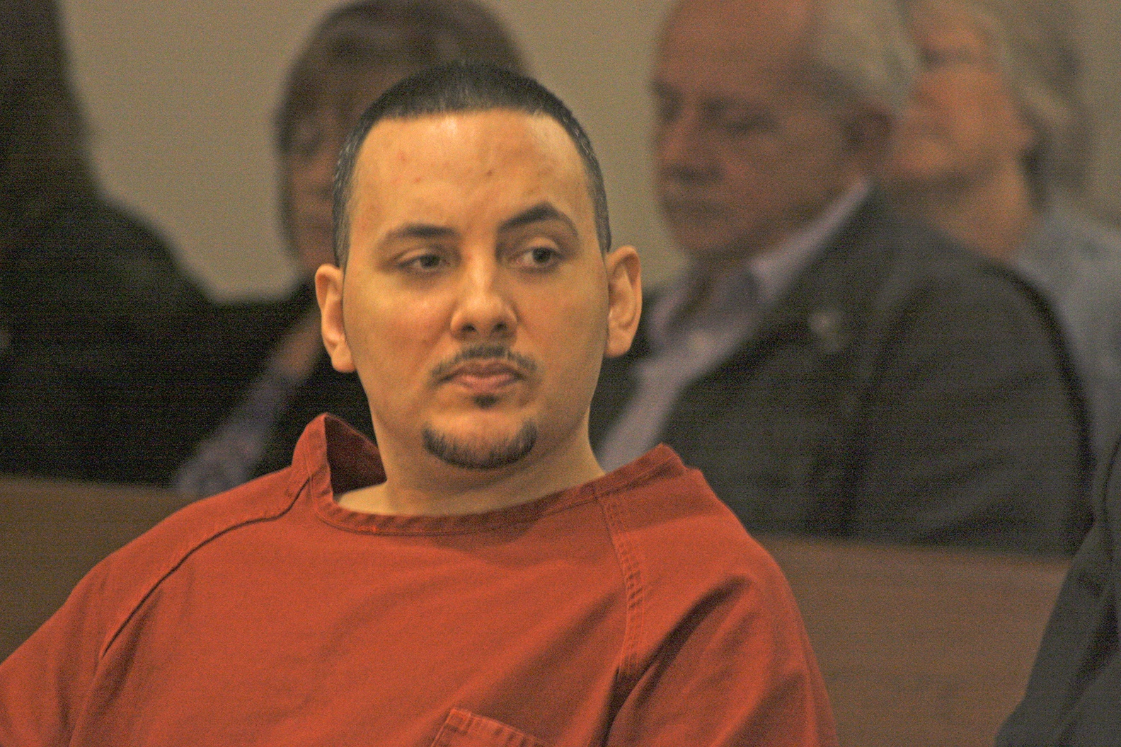 Convicted killer Leland Dean Russell Jr. looks on during his sentencing Friday at the Maleng Regional Justice Center in Kent. King County Superior Court Judge Vernonica Alicea Galvan handed down a 63-year prison term on Russell