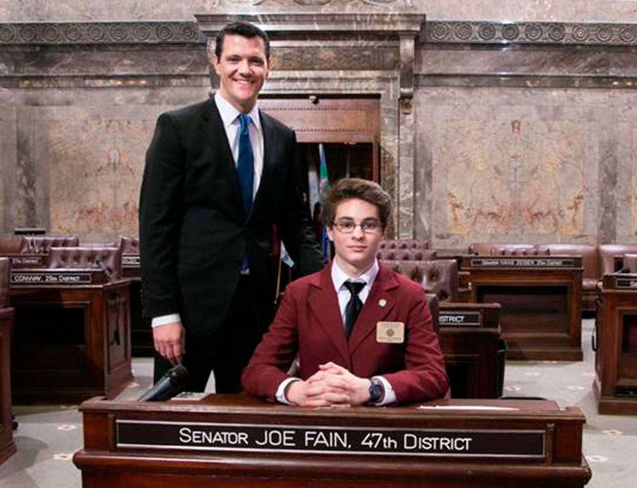 Kent-Meridian’s Benjamin Stebbins joins Sen. Joe Fain, R-Auburn, on the Senate floor. COURTESY PHOTO, Washington State Legislature