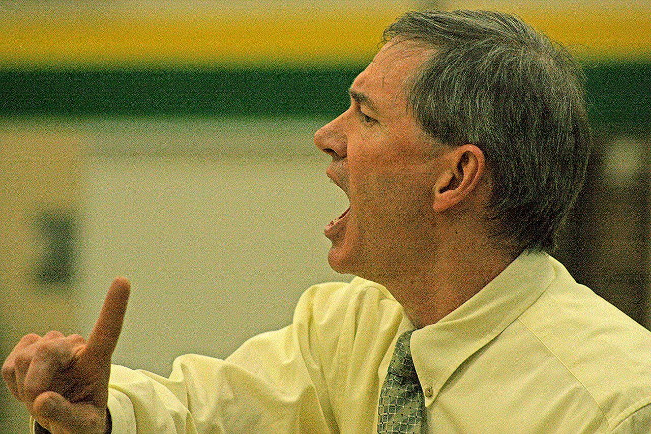 Kentridge coach Bob Sandall shouts instruction during the Chargers’ 50-33 home win against Kentlake last Friday night. The teams ended the regular season tied atop the NPSL Cascade Division, forcing a seeding game Tuesday. MARK KLAAS, Kent Reporter