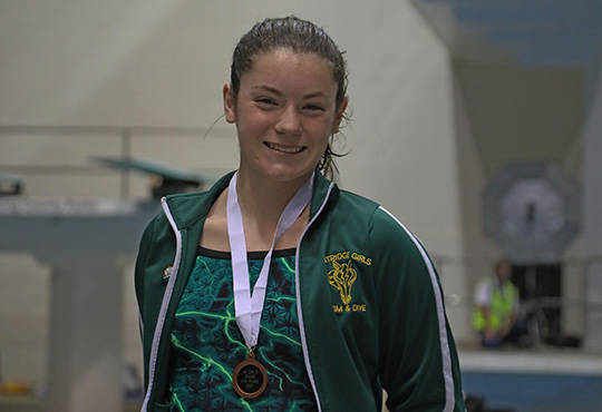 Chargers’ McKnight soars to fourth in state 4A diving finals