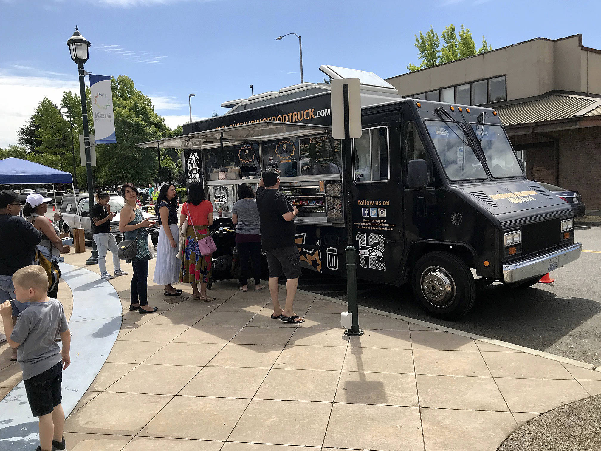 A food truck draws customers in the Town Square Plaza. MARK KLAAS, Kent Reporter