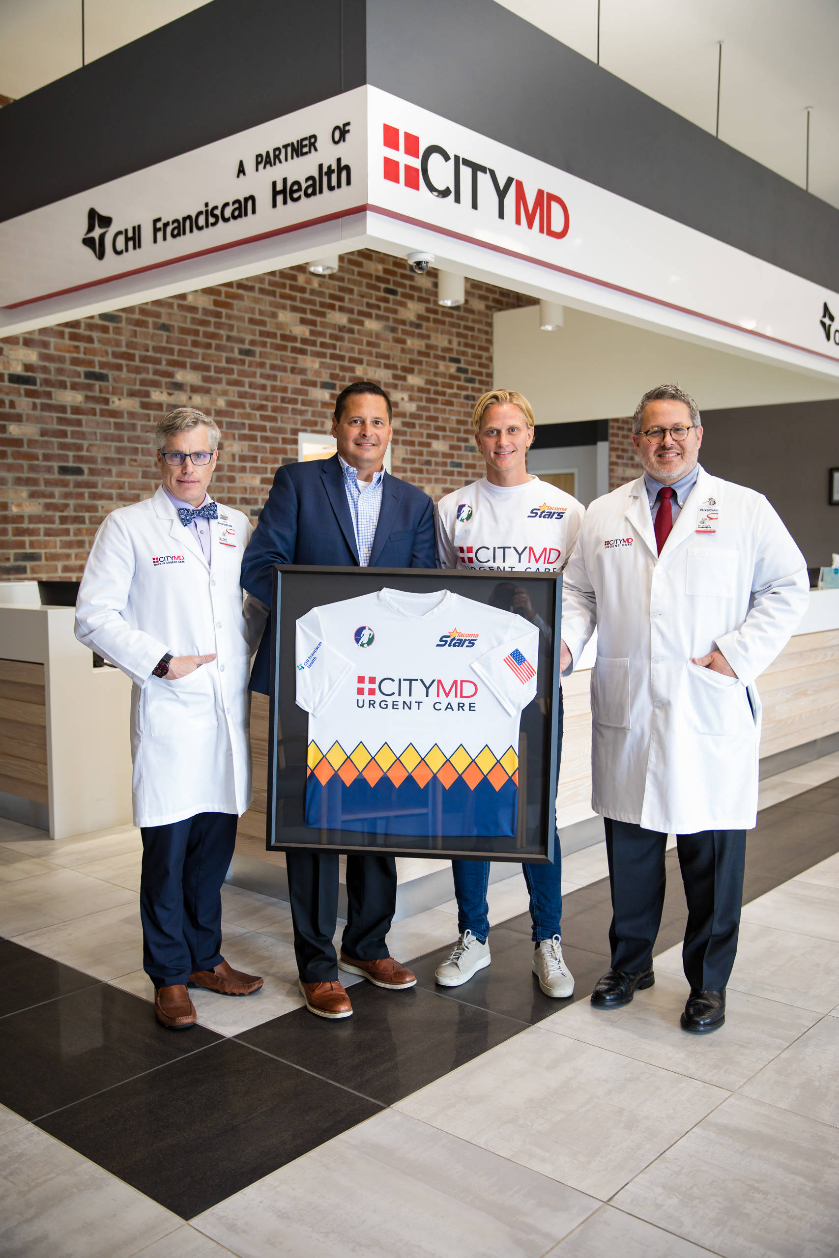 The Stars unveiled their new kit Monday at the &lt;a href="https://www.citymd.com/urgent-care-locations/wa/kent/kent/047" target="_blank"&gt;Kent CityMD &lt;/a&gt;&lt;a href="https://www.citymd.com/urgent-care-locations/wa/kent/kent/047" target="_blank"&gt;location&lt;/a&gt;. Joe Passanante, MD and Tyler Munson, MD from CityMD, along with Stars owner Lane Smith and midfielder Phillip Lund revealed the first look at the new jersey. COURTESY PHOTO