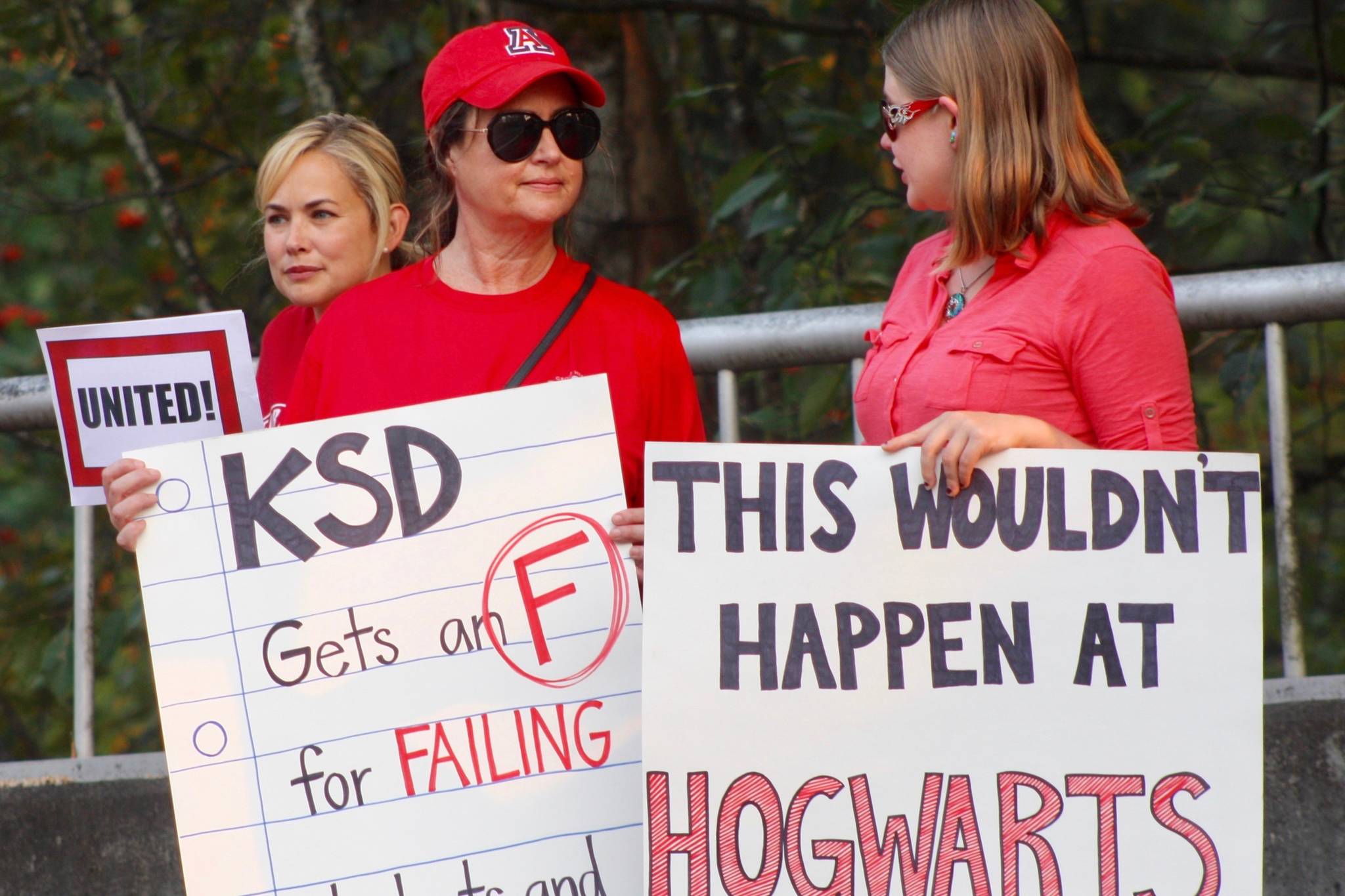 Members of the Kent Association of Paraeducators rally outside school district offices Wednesday, Aug. 22. Like teachers, paras were seeking higher wages. MARK KLAAS, Kent Reporter