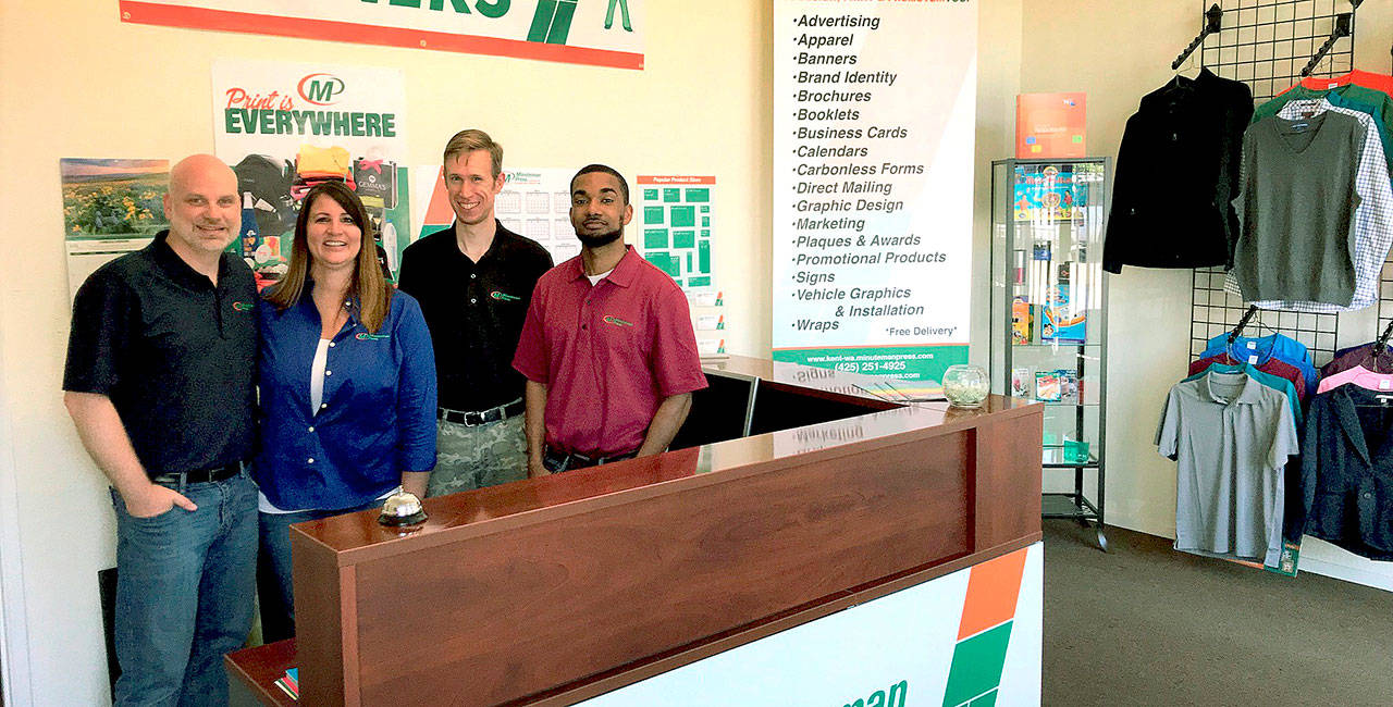 Meet the team of Minuteman Press in Kent, from left: Dawn Brown; Jeff Brown, Micah and Zach. COURTESY PHOTO