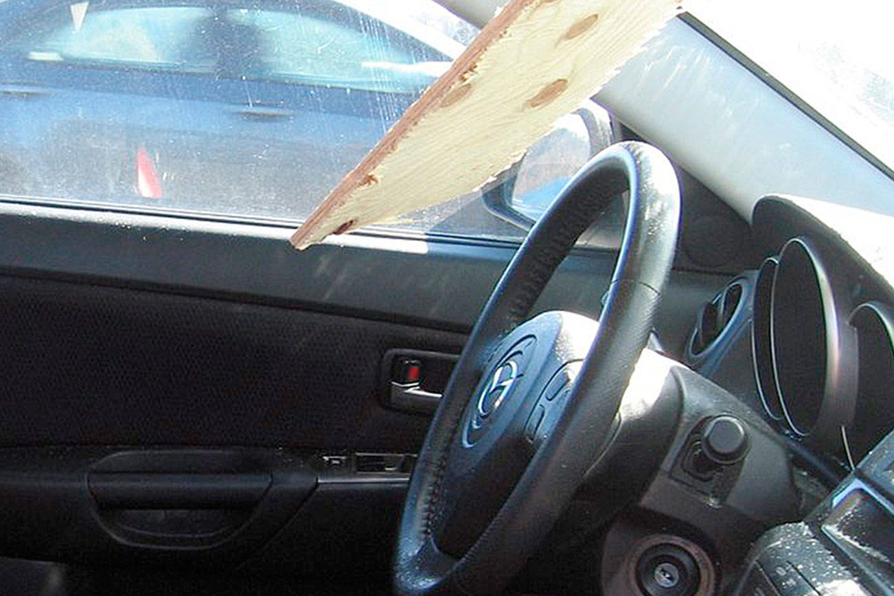 Lumber crashes through vehicle’s windshield in Kent