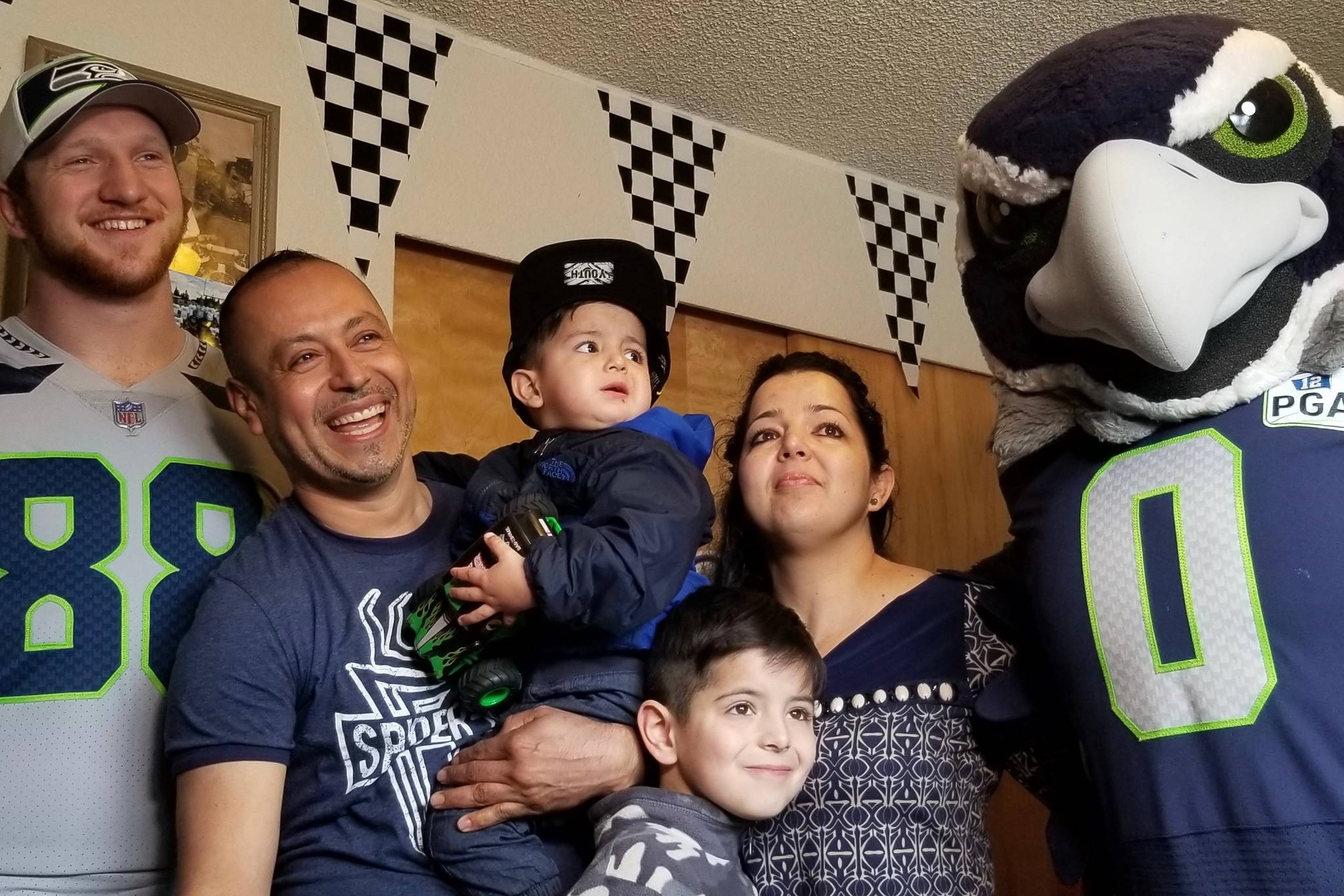 Monster Jam, Seahawks team up to surprise Mercy Housing family in Kent