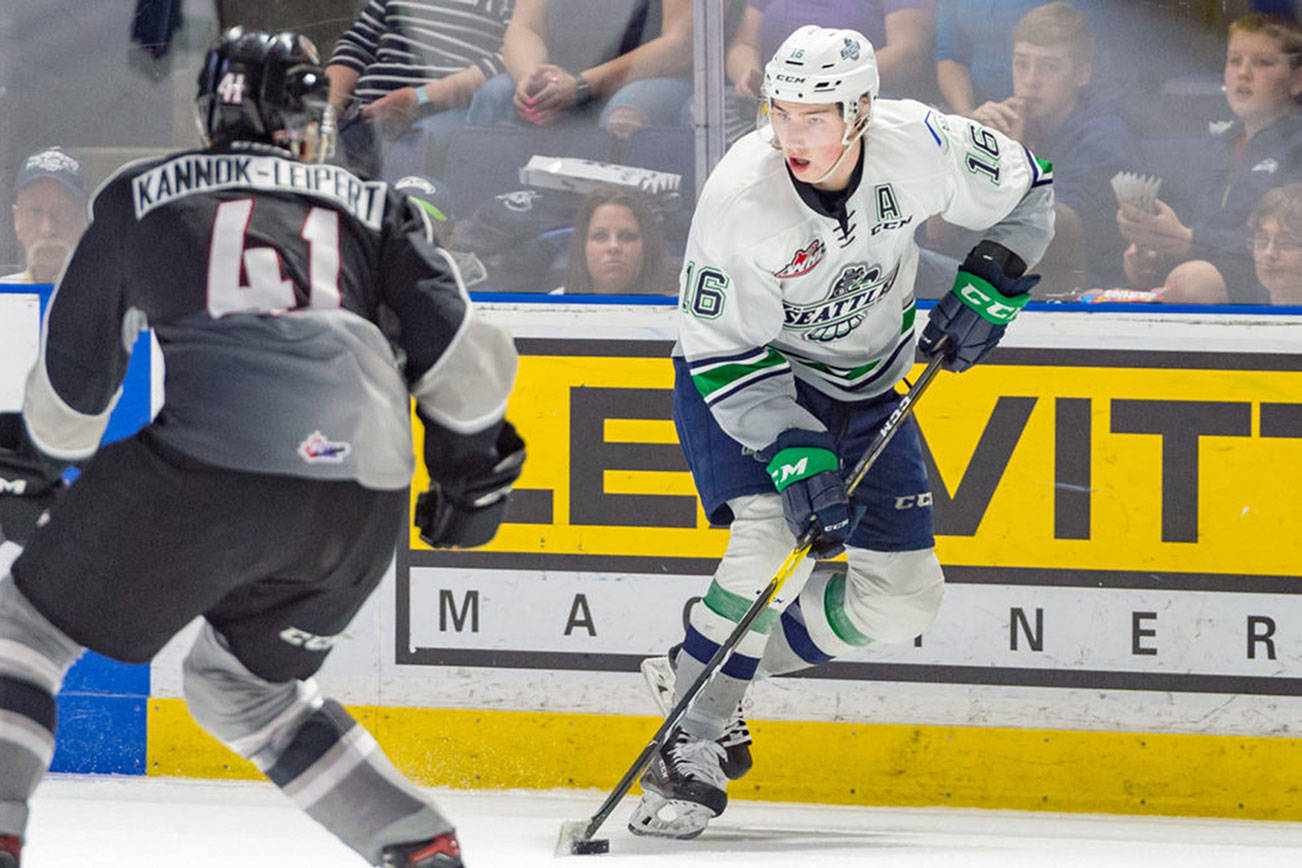 The Thunderbirds’ Noah Philp looks to pass the puck as the Giants’ Alex Kannok Leipert defends during Game 3 Tuesday. COURTESY PHOTO, Brian Liesse, T-Birds