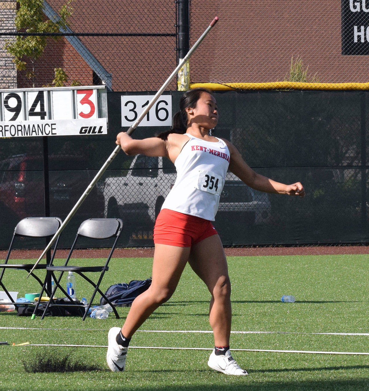 Kent-Meridian’s Amanda Pham captures the NPSL javelin title with a throw of 105 feet, 8 inches. RACHEL CIAMPI, Kent Reporter