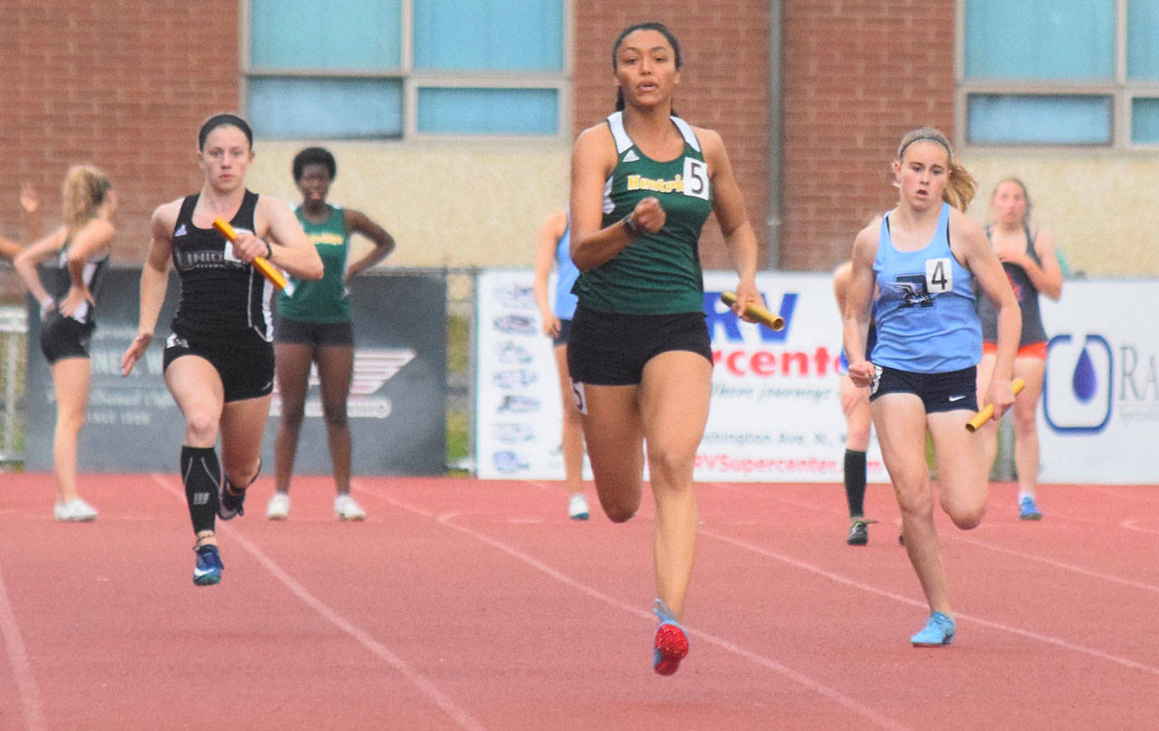 Kentridge’s Lauryn Ford anchors the 400-meter relay at the bi-district meet. Ford and the Chargers finished in 48.54 seconds, the second-fastest time at the meet. RACHEL CIAMPI, Kent Reporter