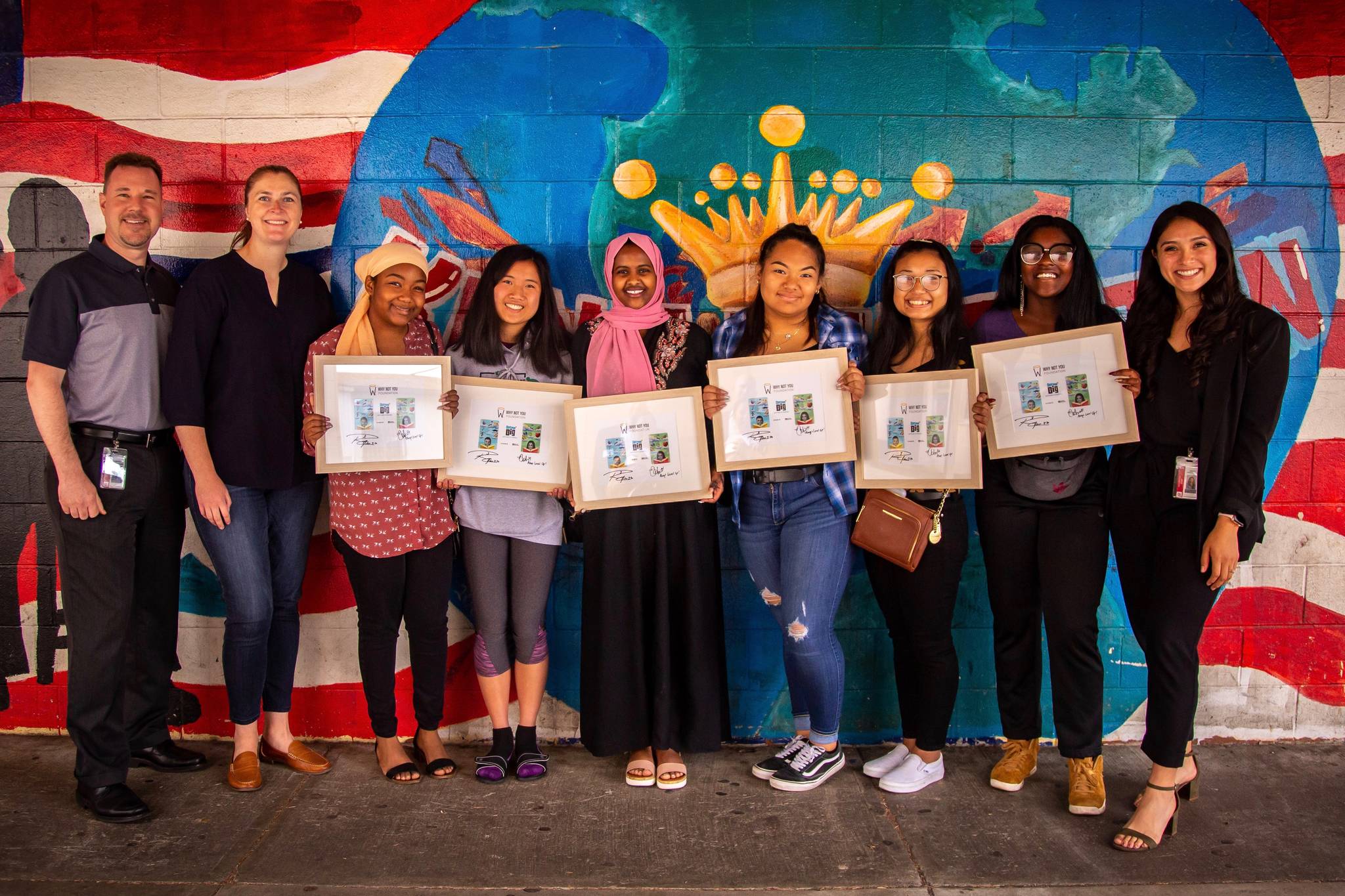 Five Kent-Meridian High School students became Why Not You Scholars. At the presentation were, from left: K-M Principal David Radford; Carly Young, executive director of the Why Not You Foundation; scholars Djamila Oumarou; Katie Liu; Najma Abdirizak; Monserrat Palacios-Aguirre; Aye Aye Aung; and Raquel Rodgers; and Erika Enciso-Castillo, CPA, College Success Foundation. COURTESY PHOTO, Why Not You Foundation