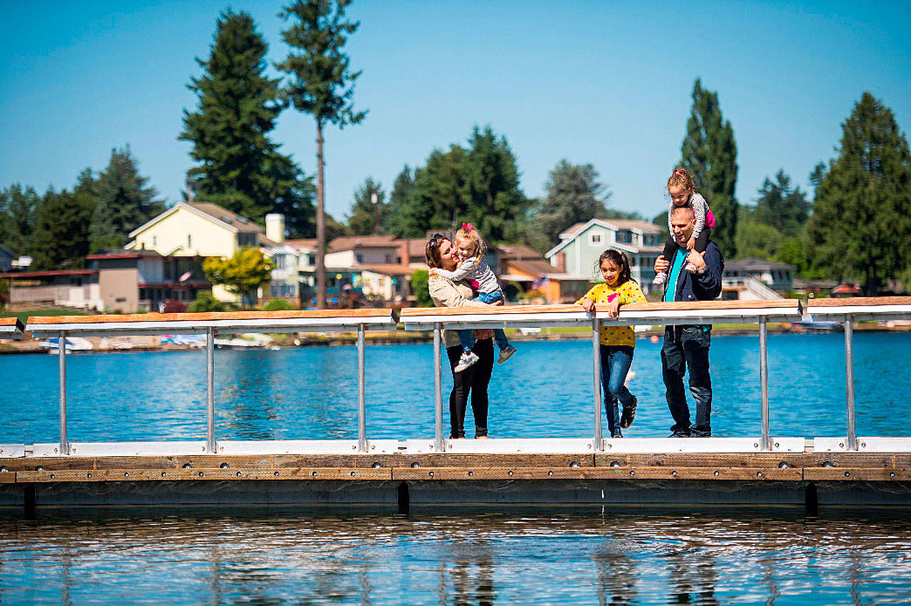 A family enjoys the Lake Meridian Park dock. COURTESY PHOTO, city of Kent