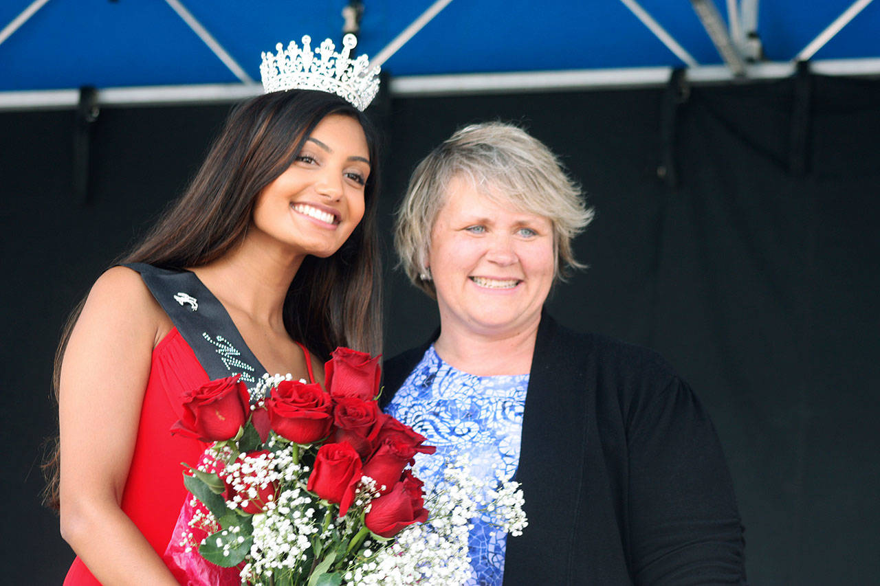 Mayor Dana Ralph joins 2019 Miss Cornucopia Roshni Sabhaya at the coronation Friday afternoon in Town Square Plaza. MARK KLAAS, Kent Reporter