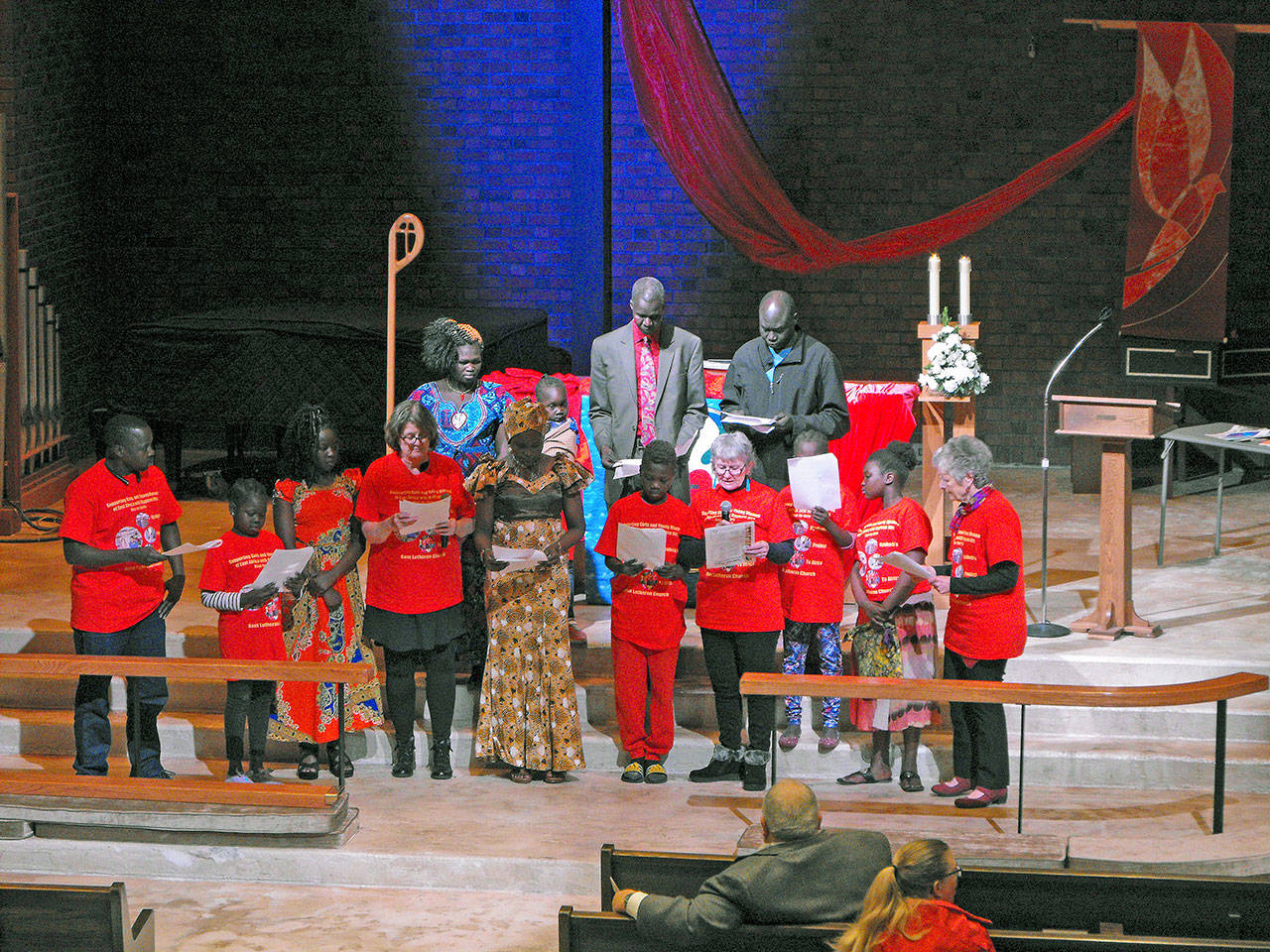 New Kent Lutheran Church members from South Sudan speak during the congregation’s 130th anniversary celebration last Saturday. COURTESY PHOTO