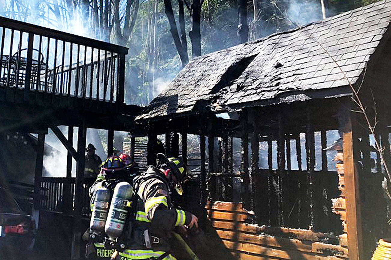 Firefighters extinguish shed fire in Kent