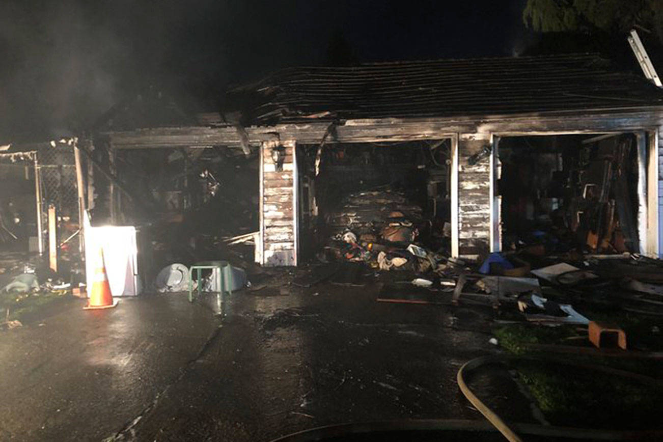 Firefighters put out garage fire in Kent