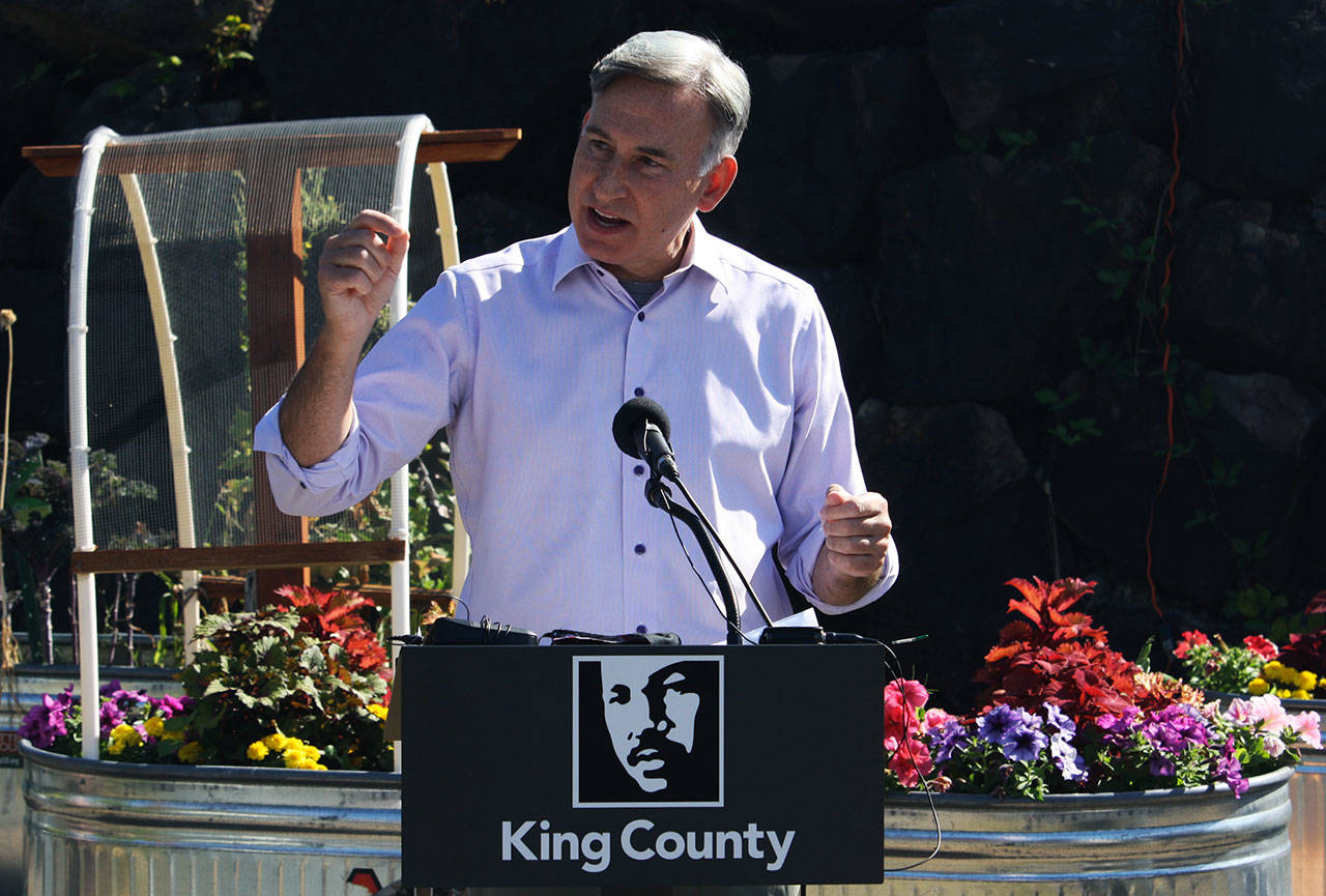 King County Executive Dow Constantine talks about his 2020 Strategic Climate Action Plan on Aug. 27 at the Paradise Parking Plots Community Garden in Kent. STEVE HUNTER, Kent Reporter