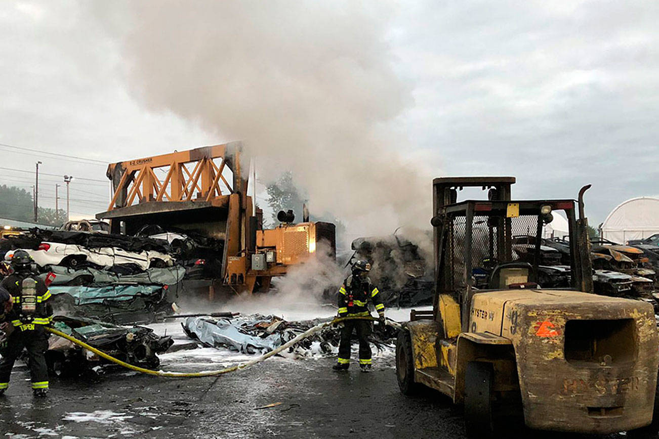 Crews extinguish fire at Kent wrecking yard