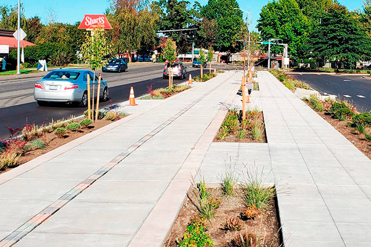 A look at the Meet Me on Meeker sidewalk upgrades completed last year looking east in front of the Riverbend Driving Range on West Meeker Street in Kent. The sidewalk project will be extended another 700 feet on the south side of the street to the Midtown 64 Apartments. COURTESY PHOTO, City of Kent