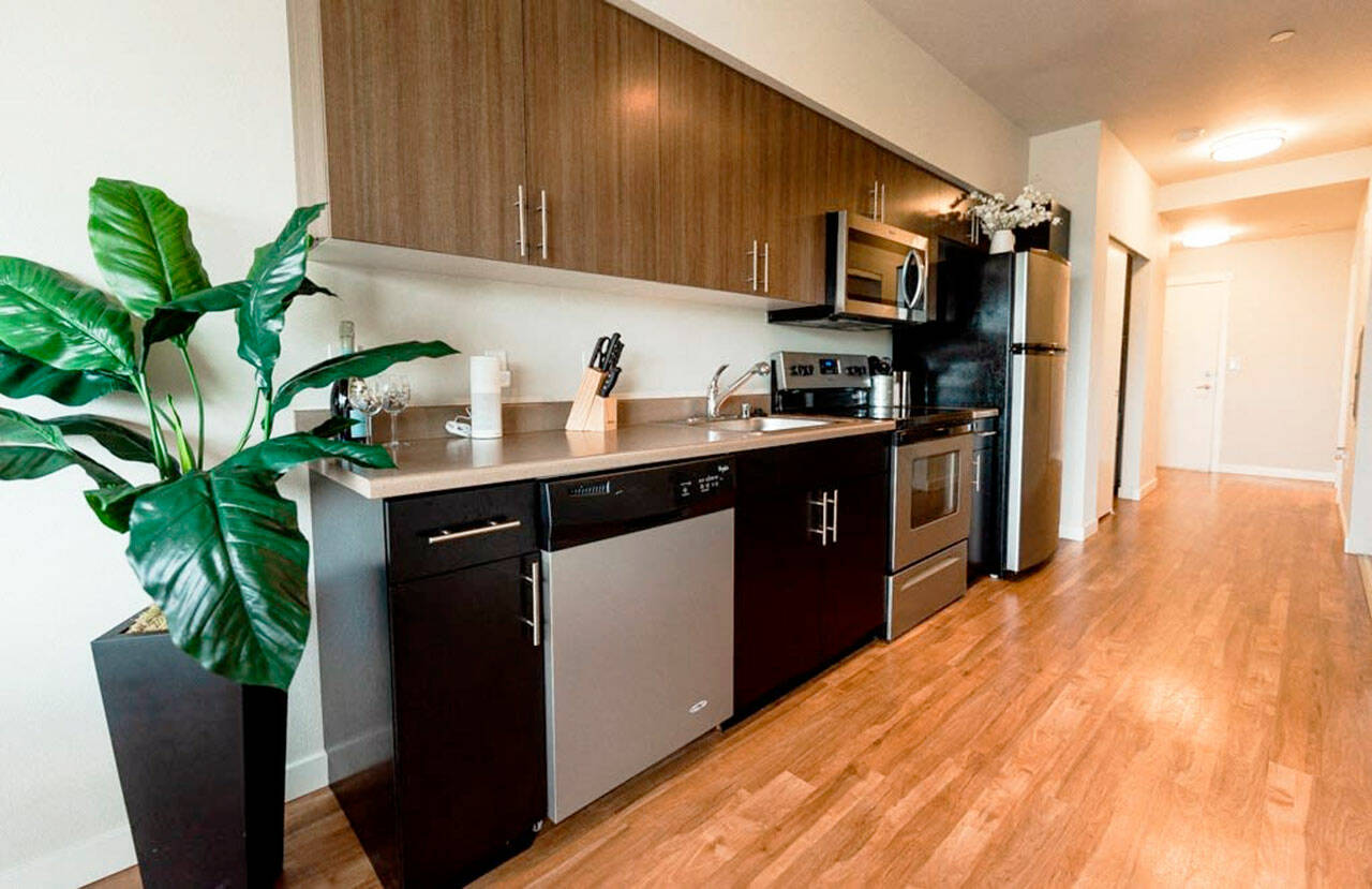 A kitchen and entry area at The Platform Apartments in Kent. COURTESY PHOTO, The Platform Apartments