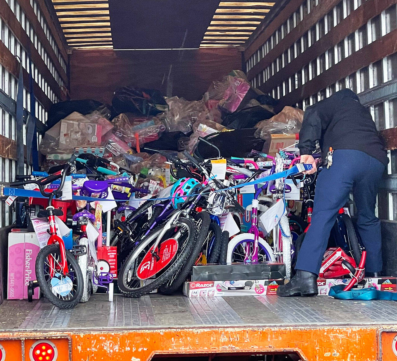 Many gifts were distributed Dec. 22 by Puget Sound Fire as part of its annual Toys for Joy program. COURTESY PHOTO, Puget Sound Fire