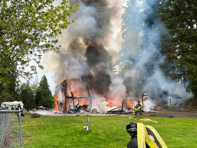 A Kent barns goes up in flames Thursday morning, April 28 in the 23600 block of 156th Avenue SE. COURTESY PHOTO, Puget Sound Fire