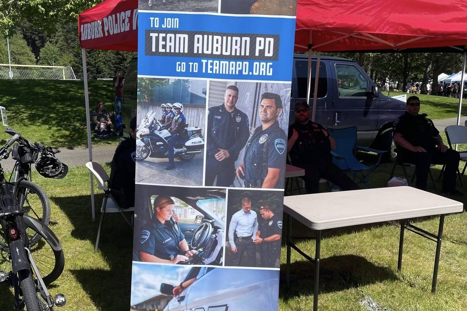 Auburn Police use photo of on officer banner recruitment Reporter | embattled Kent