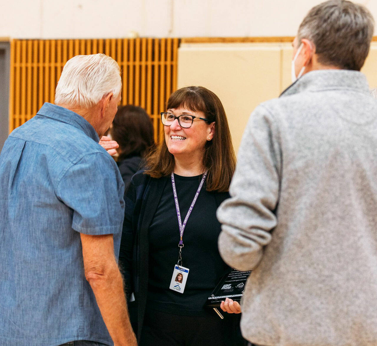 Lori Hogan chats with those who attended a June 30 ceremony to name the Kent Commons gym after her. COURTESY PHOTO, City of Kent