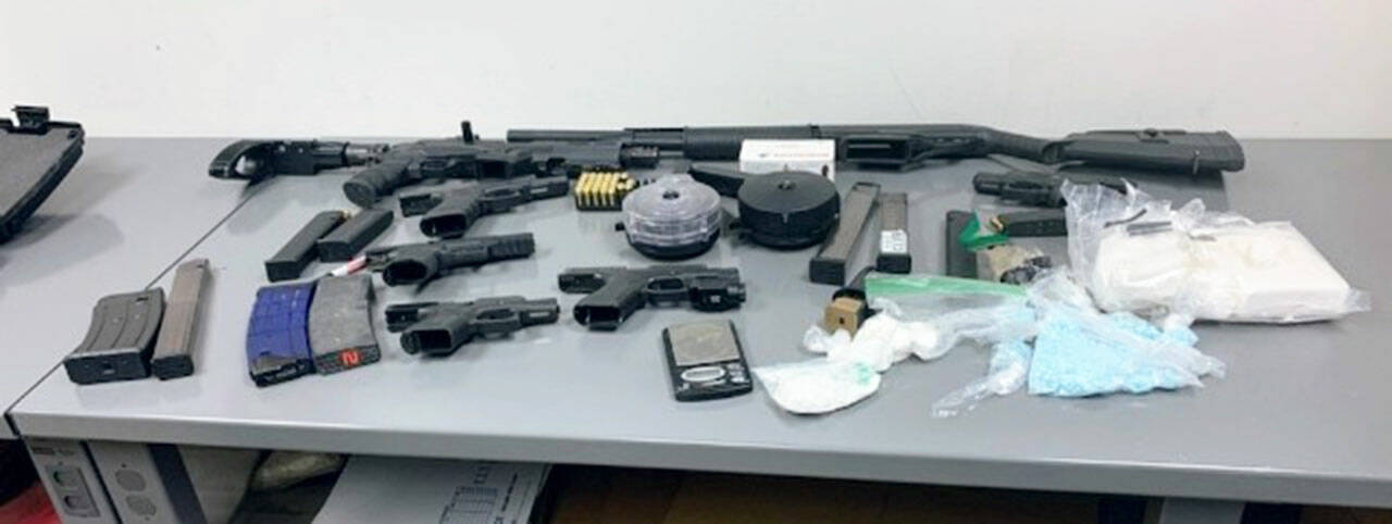 Federal law enforcement seized guns during part of a drug trafficking bust in Washington and California. COURTESY PHOTO, FBI