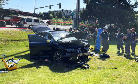 A vehicle rolled and ended up off the road June 15 in a two-vehicle collision along SE 240th Street near 120th Avenue SE. COURTESY PHOTO, Puget Sound Fire