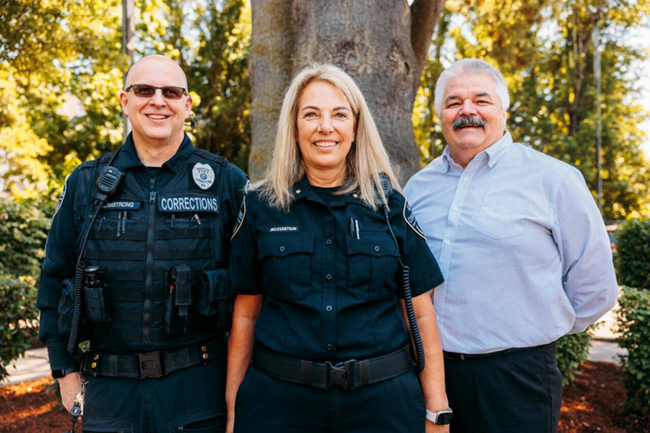 Newly promoted City of Kent Corrections Cmdr. Michael Armstrong, with recently retired Corrections Cmdr. Diane McCuistion and her predecessor retired Cmdr. Curt Lutz. COURTESY PHOTO, Kent Police