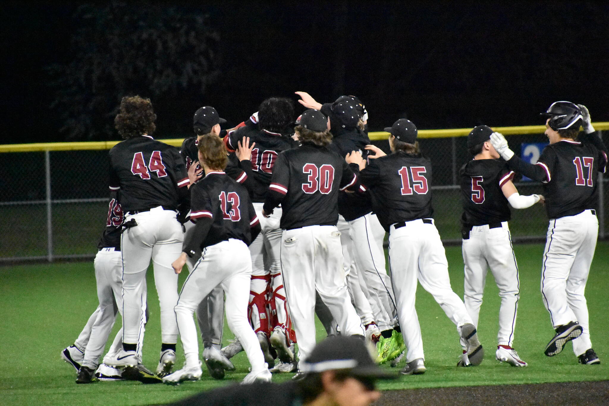 Kentlake celebrates in centerfield after Christopher Moore’s game winning hit. Ben Ray / The Reporter