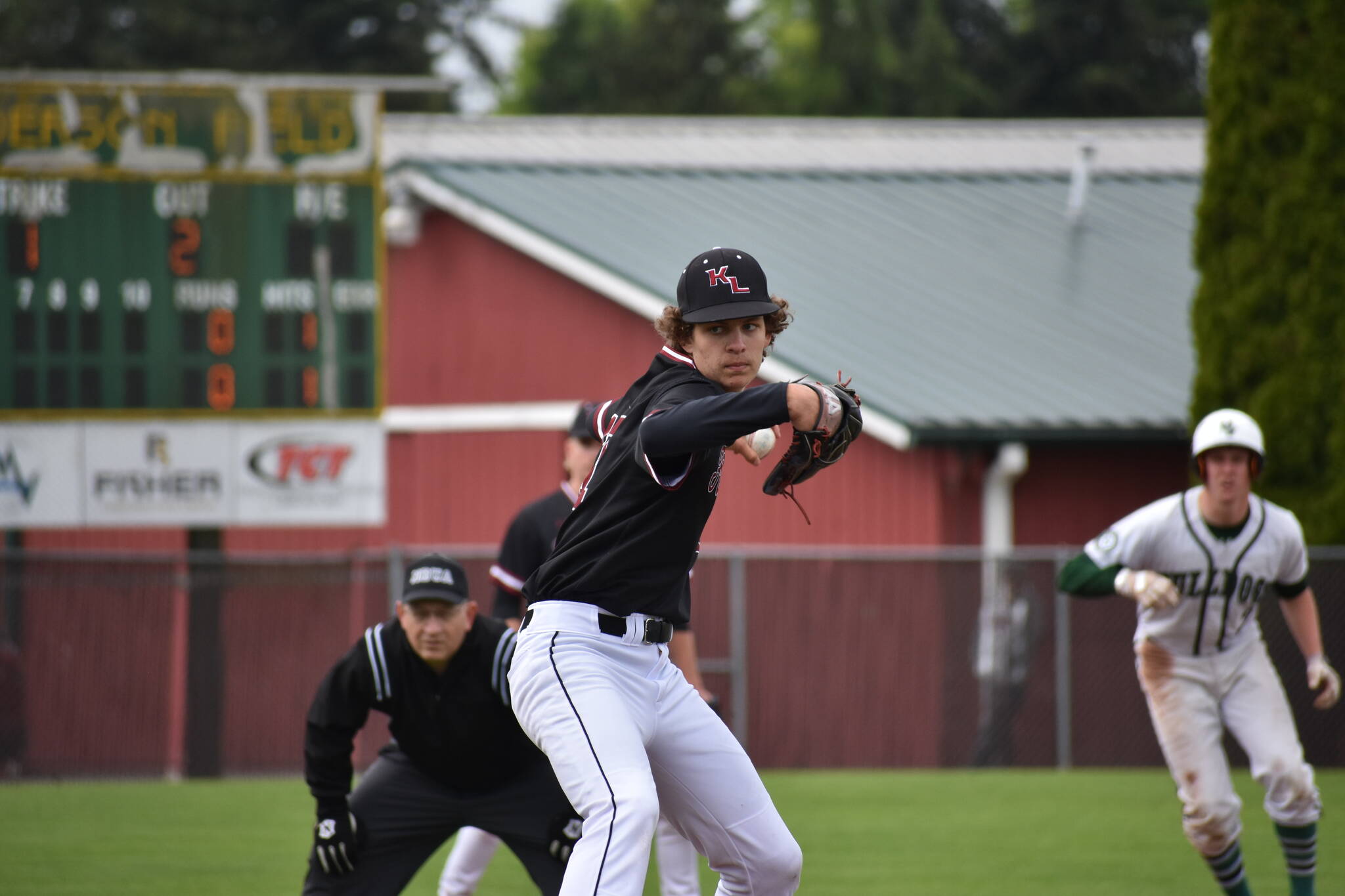 Ethan Loghry on the mound for Kentlake. Ben Ray / The Reporter