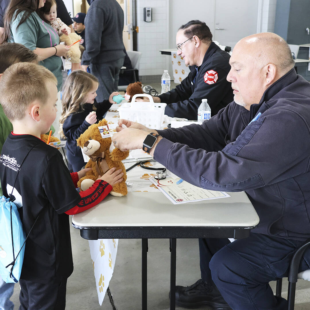 Puget Sound Fire personnel conduct a wellness check on teddy bears. COURTESY PHOTO, Puget Sound Fire