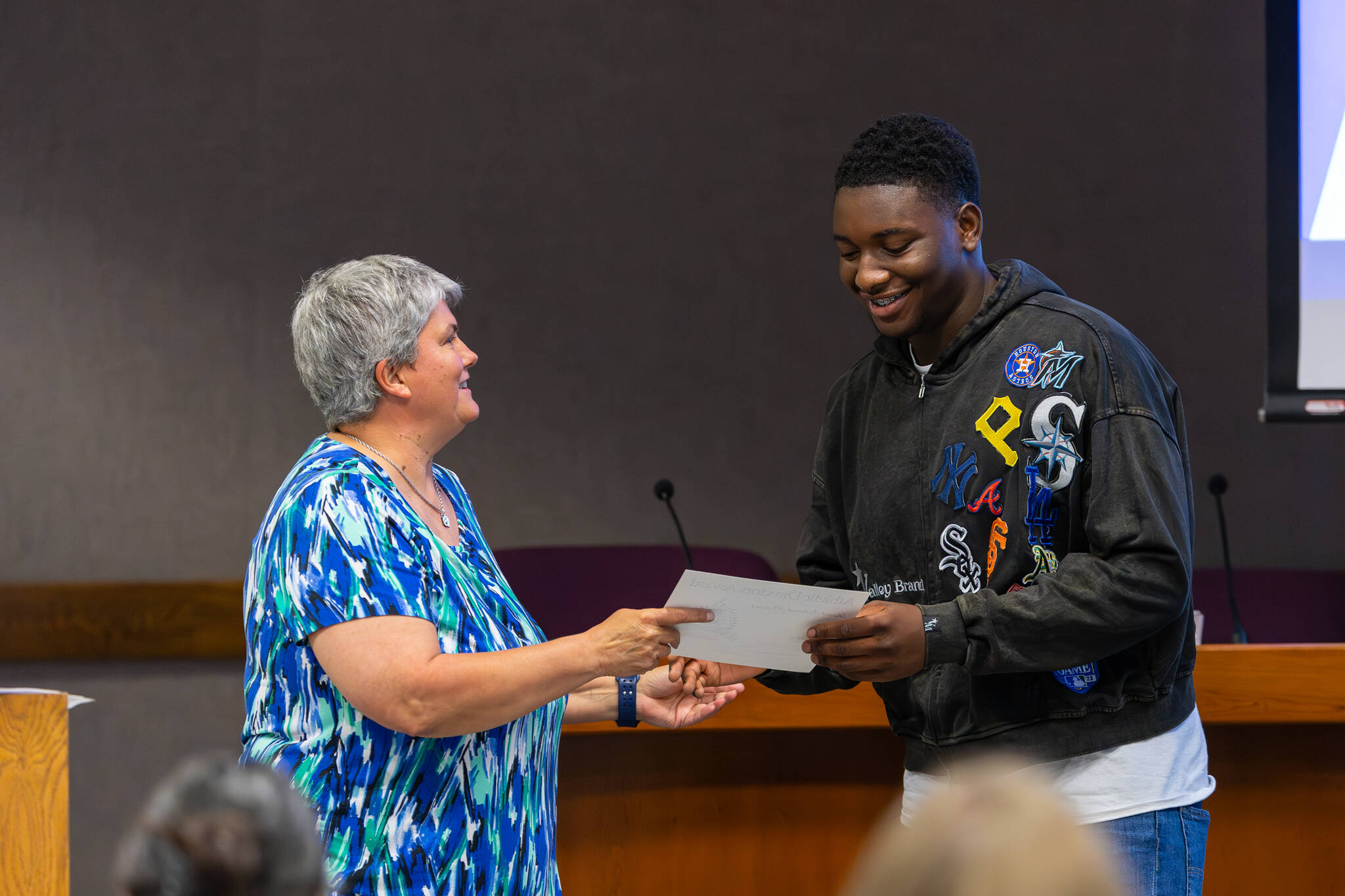 Kent-Meridian’s Zoe Emery receives recognition for his nomination to the athlete of the year competition. Photo by Robby Mullikin