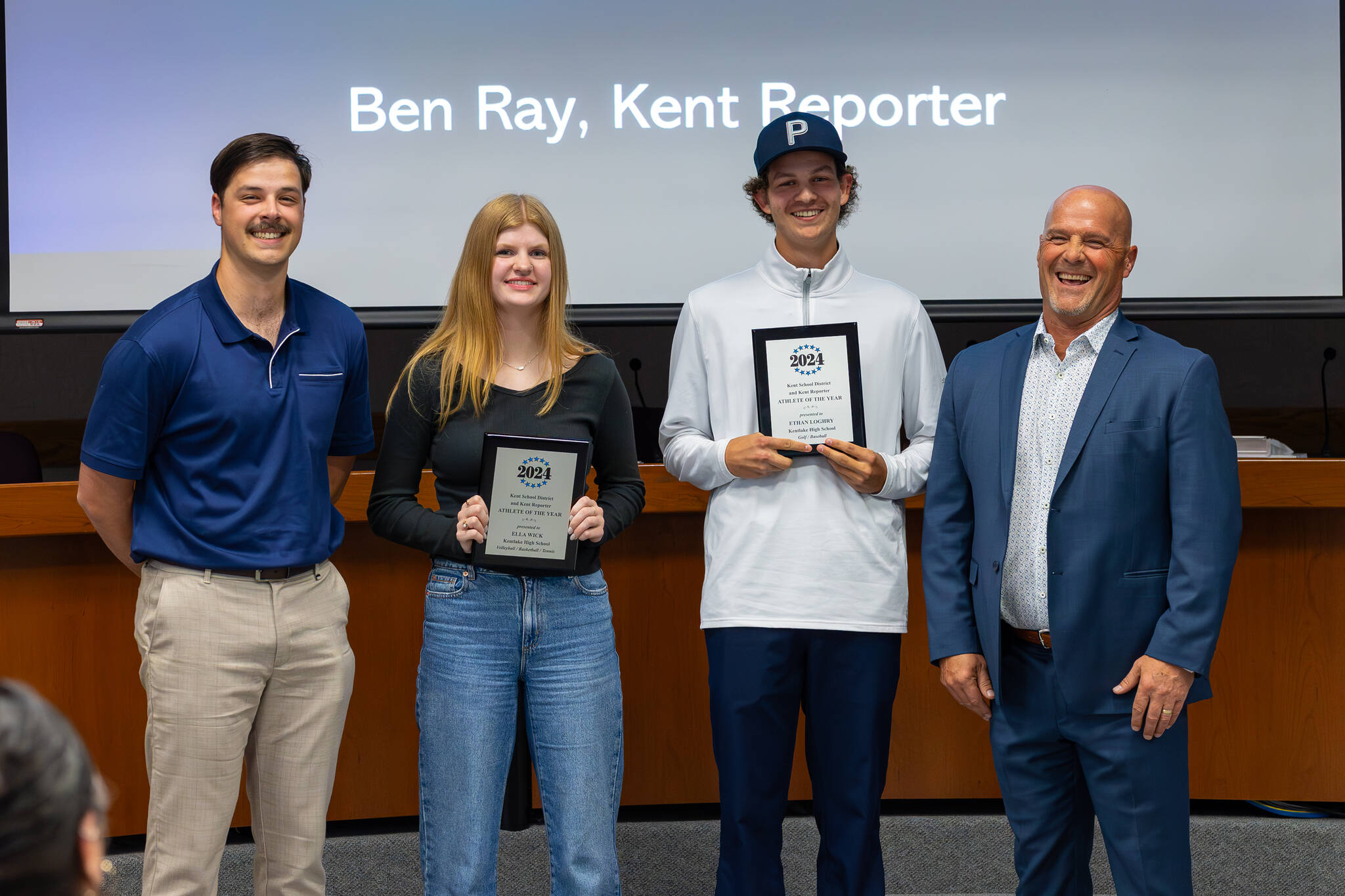 2024 Kent Reporter Athletes of the Year are Ella Wick and Ethan Loghry. Pictured left to right: Kent Reporter sports writer Ben Ray, Ella Wick, Ethan Loghry, and Brian Smith, Kent School District Director of Athletics and Activities. Photo provided by ROBBY MULLIKIN