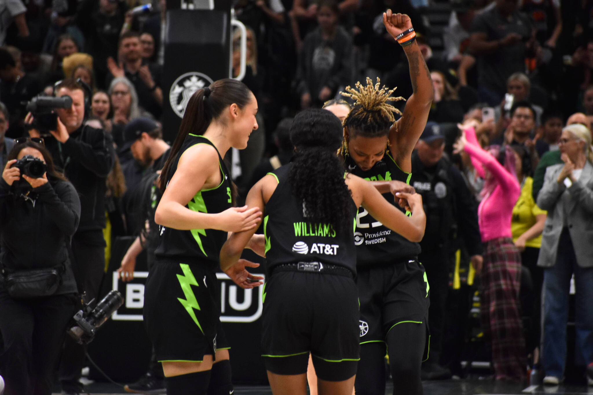 Nika Mühl, Kiana Williams and Jordan Horston celebrate the win over Los Angeles. Ben Ray / The Reporter