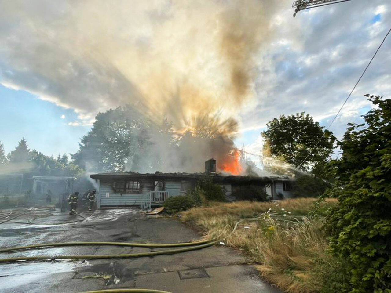 Puget Sound Fire crews respond July 24 to a vacant house fire in the 26000 block of 116th Avenue SE. COURTESY PHOTO, Puget Sound Fire