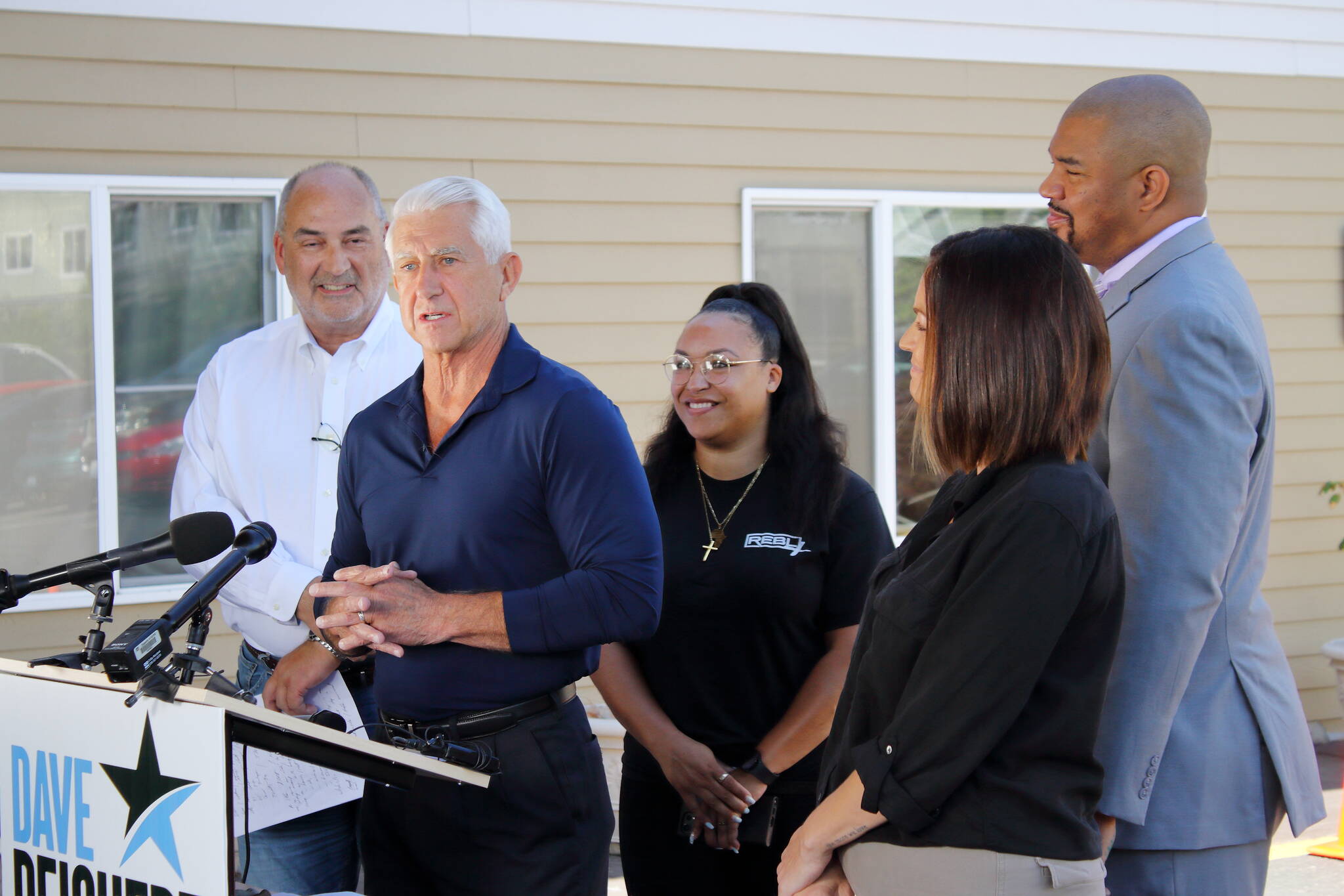 Republican candidate for governor Dave Reichert stands with service providers who spoke at his press conference on Wednesday, July 31, at FUSION Family Center in Federal Way. Photo by Keelin Everly-Lang / Sound Publishing