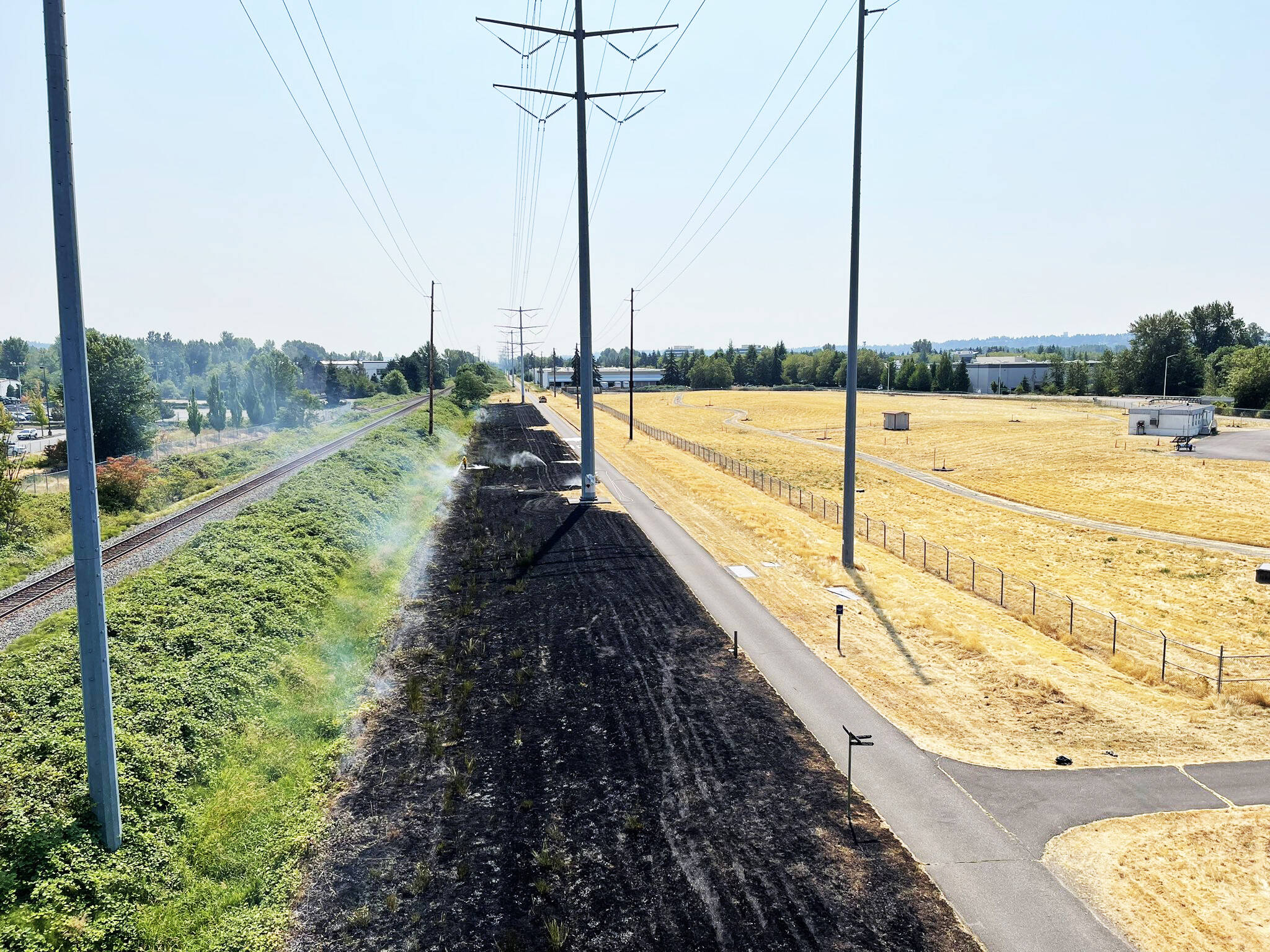 A brush fire damaged grass in Kent Aug. 8 along the Interurban Trail near South 196th Street. COURTESY PHOTO, Puget Sound Fire