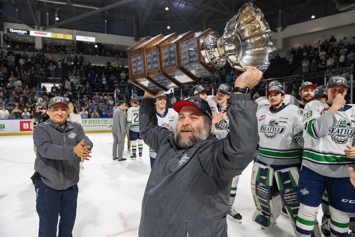 Trainer Phil Varney hoists the Western Hockey League title trophy won in 2023 by the Kent-based Seattle Thunderbirds. COURTESY FILE PHOTO, Seattle Thunderbirds