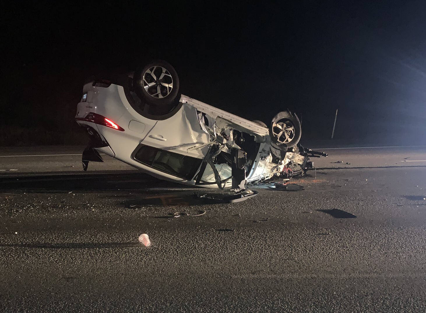 This vehicle was traveling at a high rate of speed on northbound I-5 Thursday morning, Aug. 22 near SeaTac (South 188th Street) when it hit another vehicle and then flipped. COURTESY PHOTO, Washington State Patrol