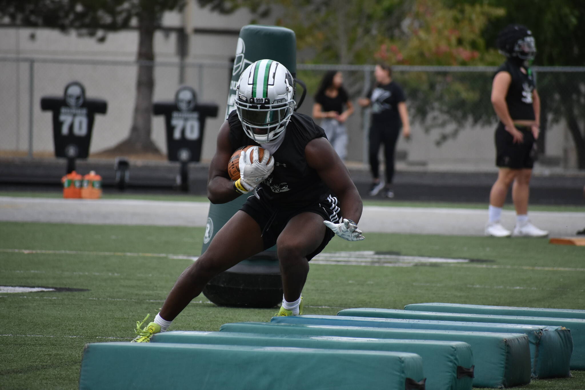 Senior RB Antoine Lee gets shift through some obstacles.