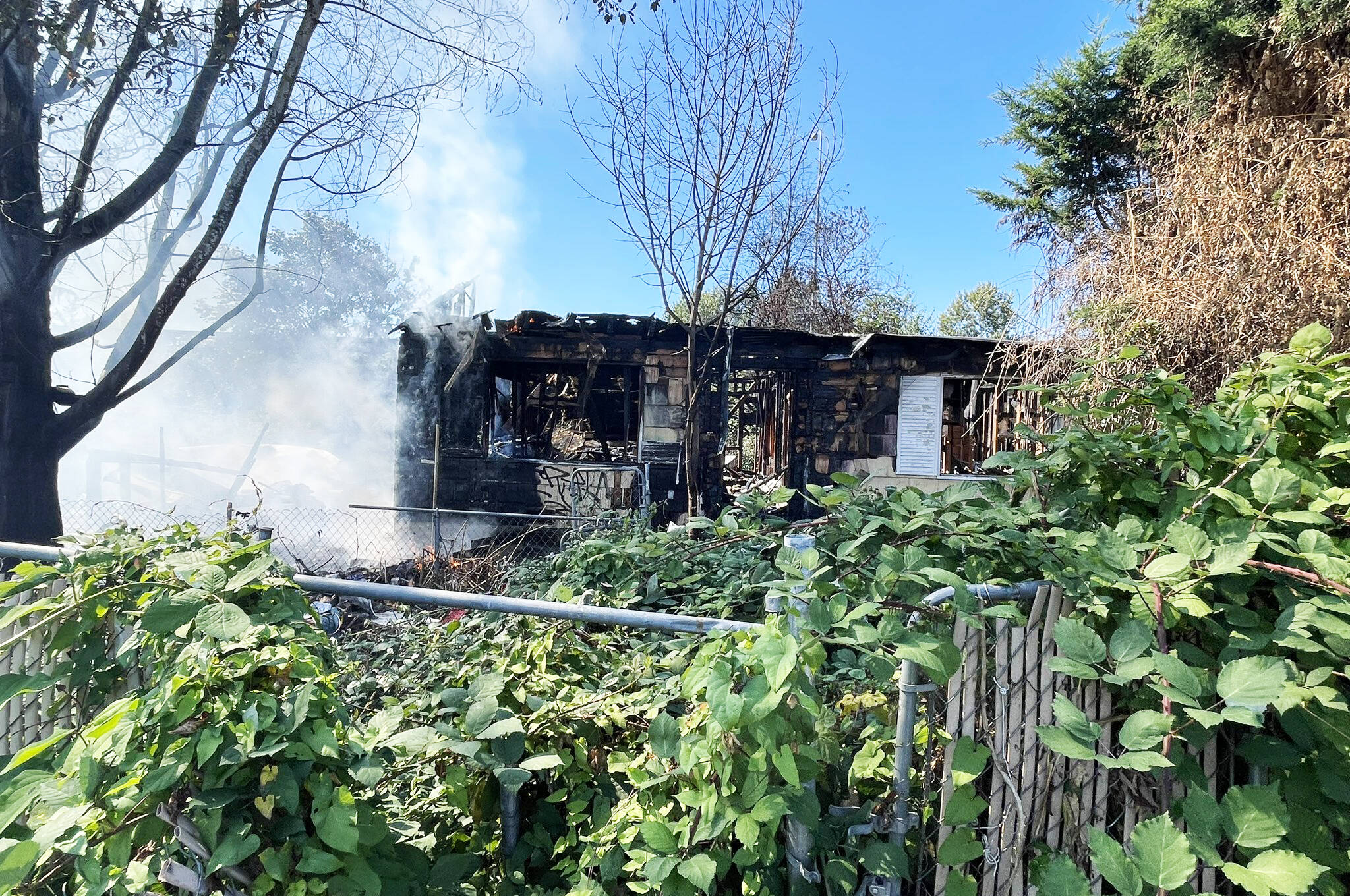 Firefighters extinguished a fire Thursday, Aug. 29 in Kent at an abandoned house in the 100 block of Naden Avenue South. This marked the fourth fire in the last eight months at the house. COURTESY PHOTO, Puget Sound Fire