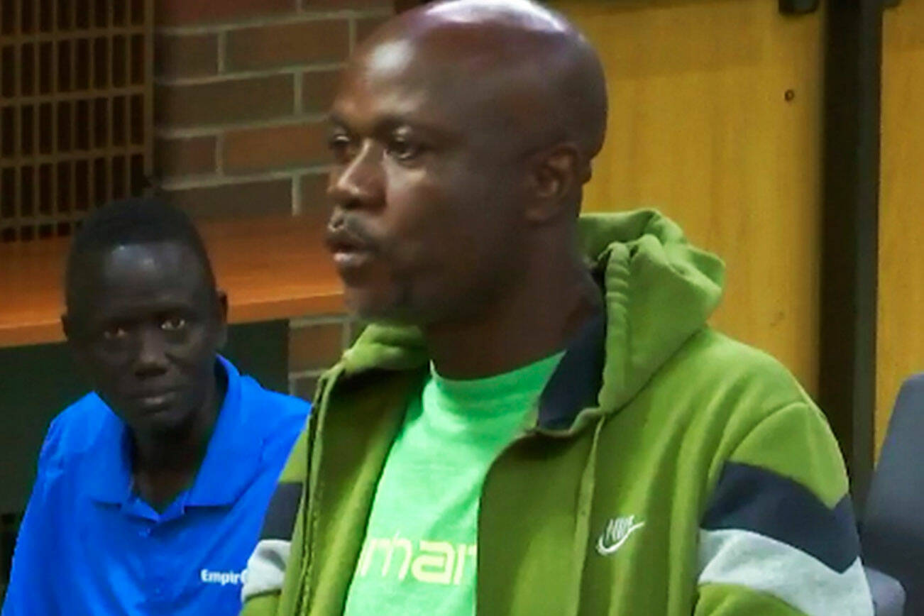 An asylum seeker asks the Kent City Council during its June 18 meeting to help reopen the former Econo Lodge. SCREENSHOT, Kent City Council video