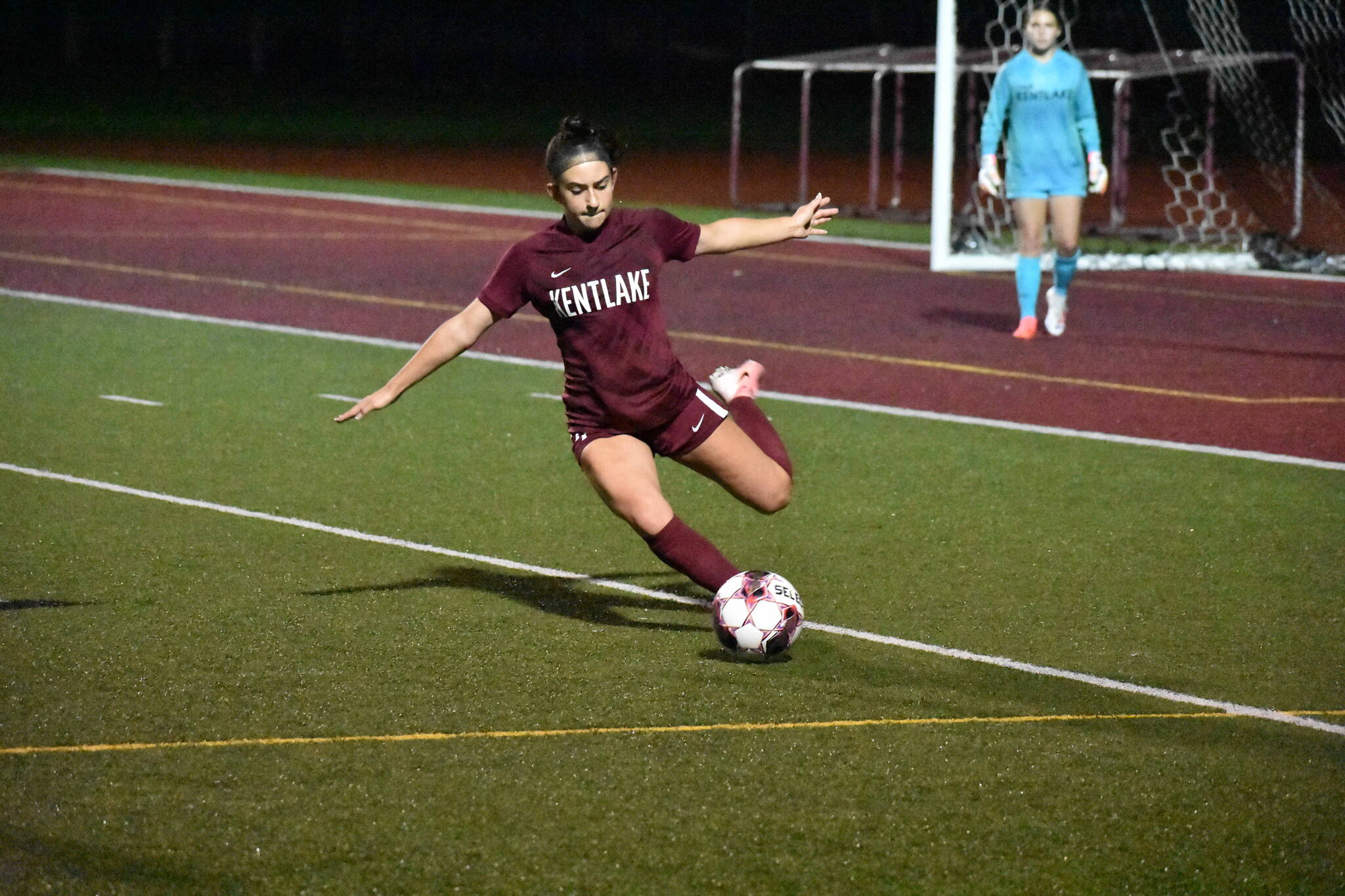 Kentlake’s Lauren Tripp attempts to clear a ball inside the Kentlake defensive third. Ben Ray / The Reporter