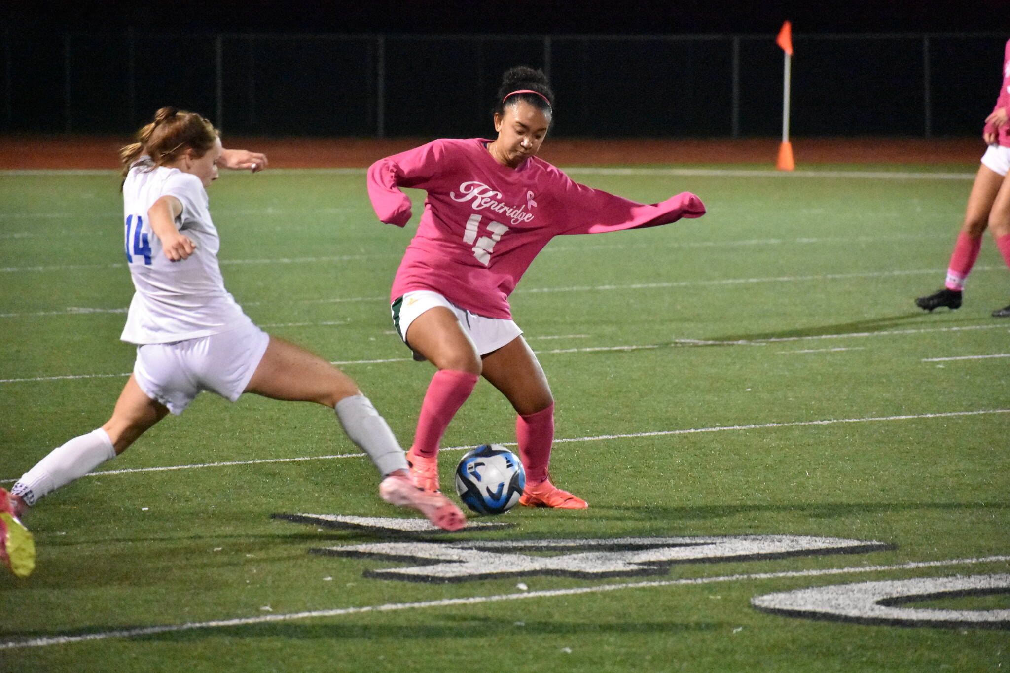 Zoey Sling wins a challenge against Tahoma late in the second half. Ben Ray / The Reporter