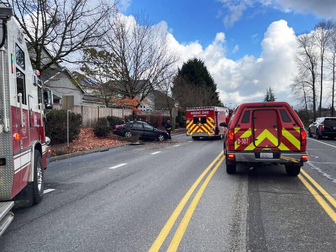 Puget Sound Fire and King County Medic One respond to a Friday morning, Nov. 15 single-car crash in the 15600 block of SE 256th Street in Covington. COURTESY PHOTO, Puget Sound Fire