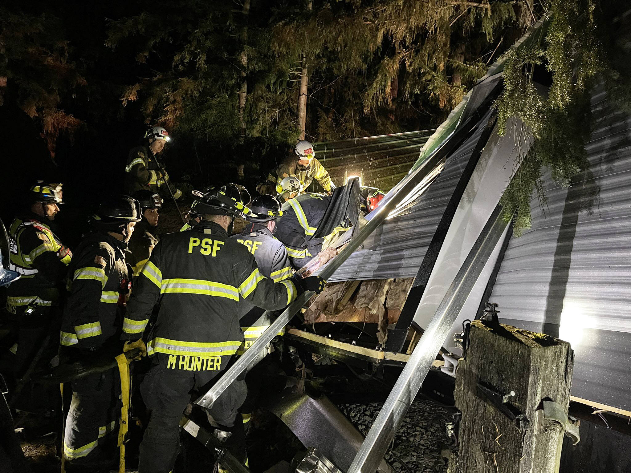 Puget Sound Fire responds Tuesday night, Nov. 19 to a tree on a trailer in the 22900 block of 184th Street in Maple Valley. Two people were in the trailer at the time. One patient was extricated in a short period of time. It took firefighters an hour to extricate the second patient. One patient was transported to a local hospital by ambulance and the second patient was transported by King County Medic One to an area hospital. COURTESY PHOTO, Puget Sound Fire