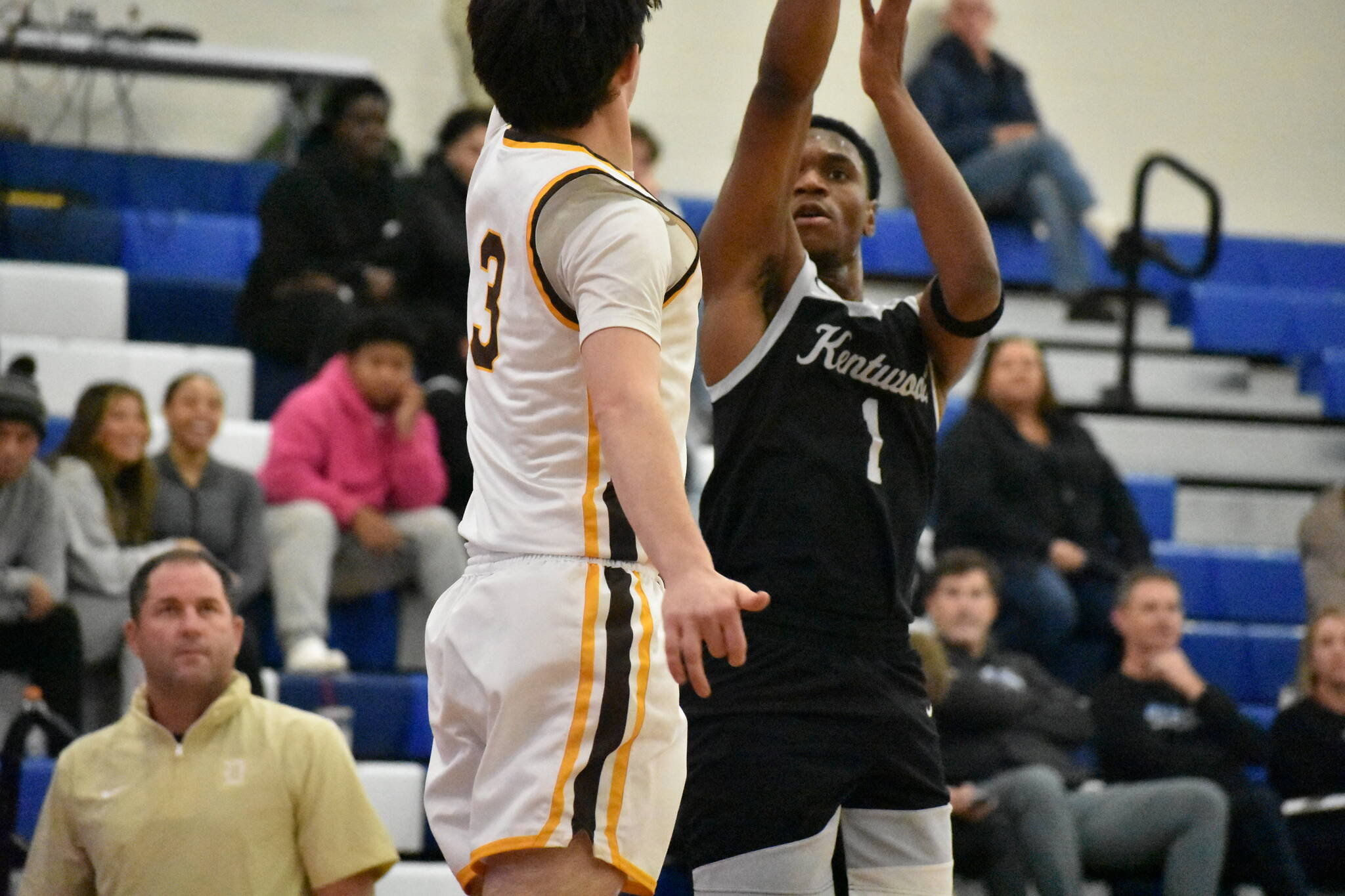 Corey Tita takes a jumpshot against Davis at the Curtis Winter Classic. Ben Ray / The Reporter